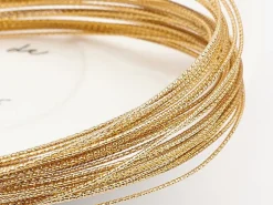 10 mètres de fil de cuivre texturé - doré brillant - 0,8 mm