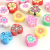 20 perles en pâte polymère - cœurs effet millefiori - multicolore