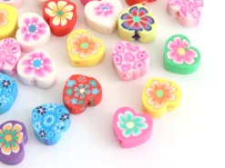 20 perles en pâte polymère - cœurs effet millefiori - multicolore