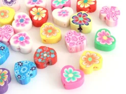 20 perles en pâte polymère - cœurs effet millefiori - multicolore