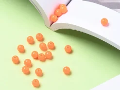 100 perles en plastique rondes 6 mm - orange fluo