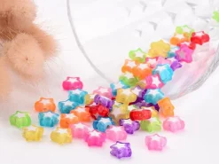 50 perles en plastique étoiles - transparent et blanc - 9x10 mm