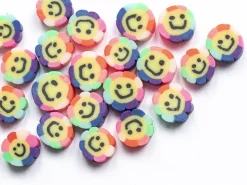 20 perles fleur sourire en pâte polymère - 9 mm