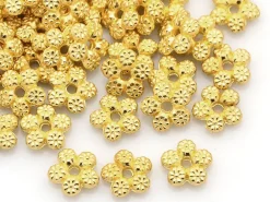 20 perles fleurs intercalaires plates et dorées - 7 mm