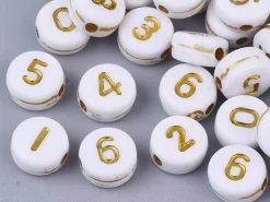 200 perles rondes en plastique - chiffres - blanches et dorées