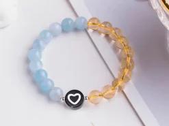 20 perles rondes en plastique - cœurs - noir et blanc