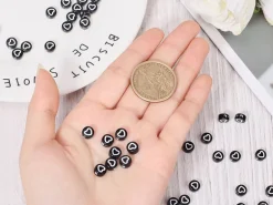 20 perles rondes en plastique - cœurs - noir et blanc