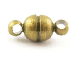 1 petit fermoir aimanté rond - couleur bronze