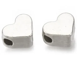50 petites perles en plastique - cœurs argentés