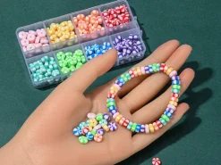 Boite de 8 couleurs de perles heishi épaisses rayées