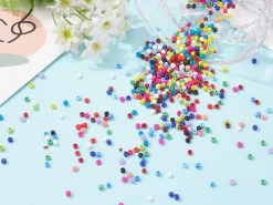 Boite de 15 couleurs de perles de rocailles - taille 8/0 soit 3 mm de diam env.