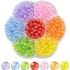 Boîte de 490 perles rondes transparentes en acrylique - 7 couleurs - 6 mm