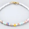 Bracelet blanc à perles millefiori en verre