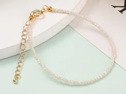 Bracelet en perles facétées - rose brume