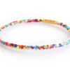 Bracelet jonc bouddhiste fantaisie - inclusion de perles de rocailles multicolores