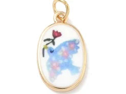 Breloque ovale motif oiseau imprimée - laiton doré