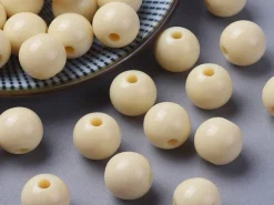 Lot de 50 perles rondes en plastique - Crème