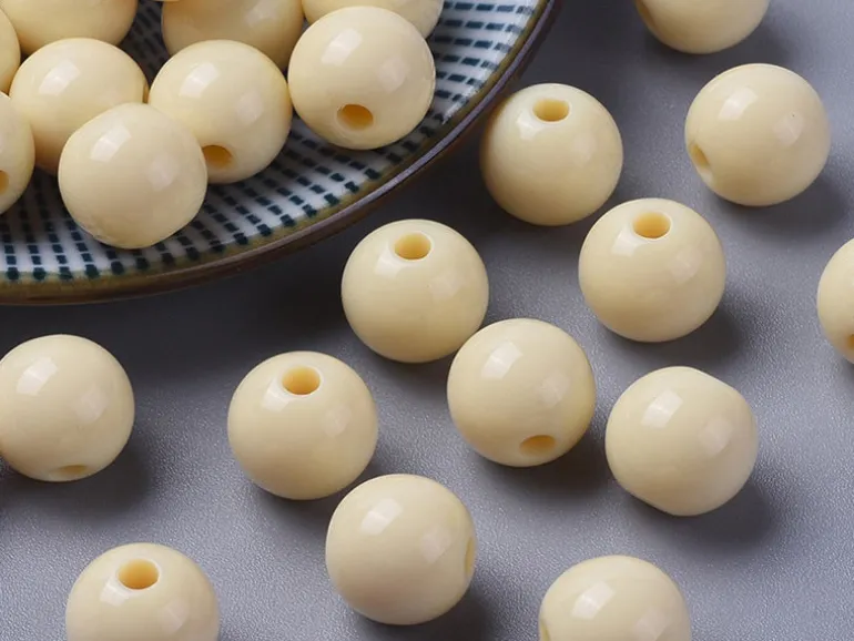 Lot de 50 perles rondes en plastique - Crème