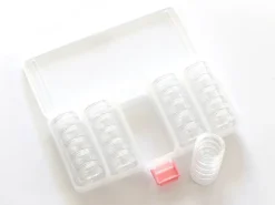 Mallette de rangement avec ses 25 petites boites rondes