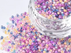 Perles de rocailles transparentes en tube - Mélange arc-en-ciel parme rosé - 2 mm