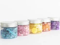 Pot de perles en plastique - nuances d'orange