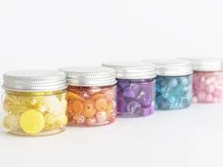 Pot de perles en plastique - nuances de jaune